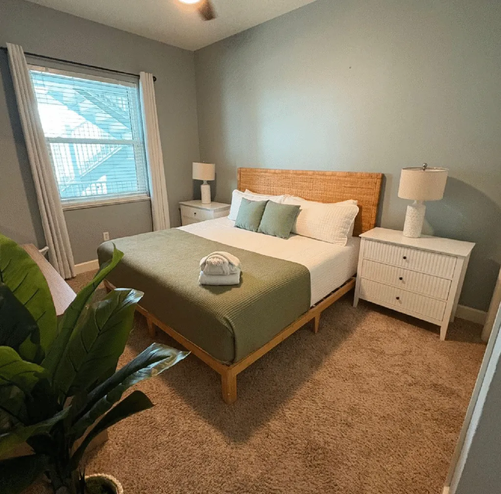 Vacation rental bedroom staged by GS Max after an Airbnb turnover